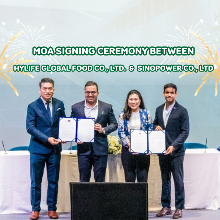 Hylife Global Food & Sinopower MOA signing ceremony with four individuals holding documents.