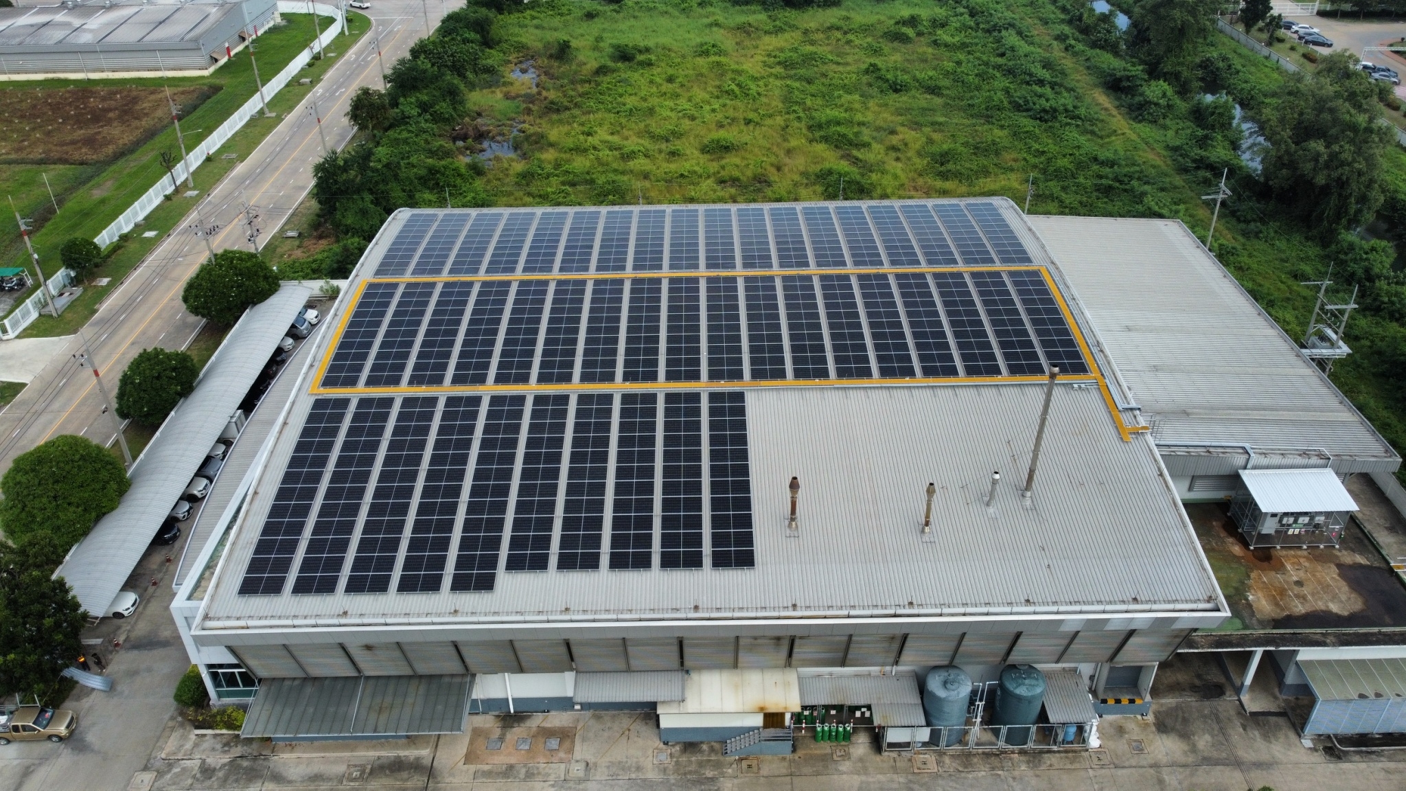 Solar panels installed on the roof of a factory building for Cara Bakery Co., Ltd.