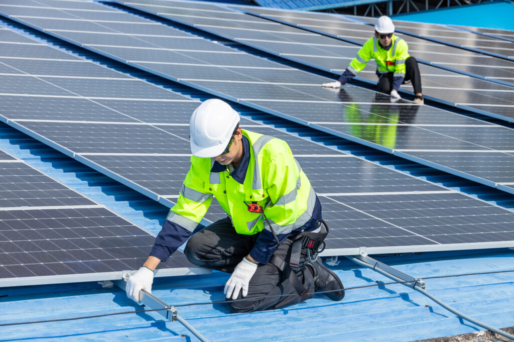 Solar panel installation by a professional team on a rooftop