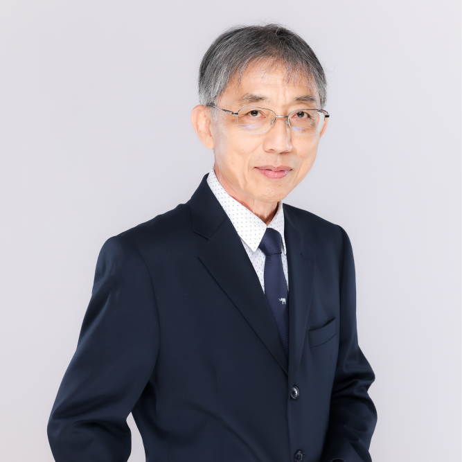 Elderly Asian man in a suit and glasses, smiling